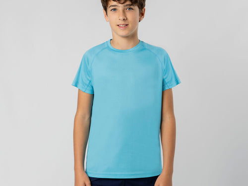 Ein kurzärmeliges technisches Kinder-Raglan-T-Shirt, bestehend aus 100 % Polyester-Waffel-Interlock-Stoff, verwendet Cool Dry-Technologie, die Atmungsaktivität und schnelles Trocknen fördert - Cocker Personalisiert