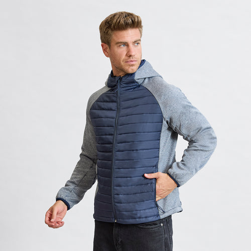 Atmungsaktive Unisex-Jacke aus einer Kombination von Softshell- und Polyester-Materialien, mit Feder-Touch-Steppung auf Vorder- und Rückseite - Kimpal Personalisiert